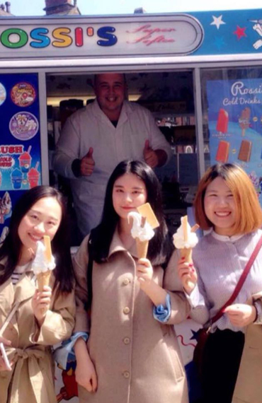 Girls Buying Ice Cream